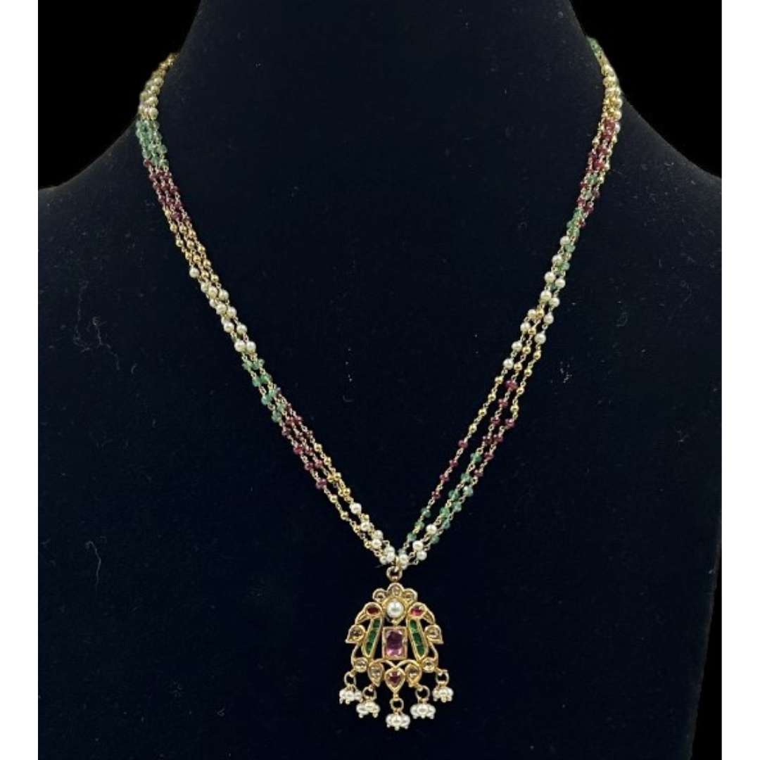 Kundan Pendant strung with Gold wire in Ruby beads,emerald beads and pearls.