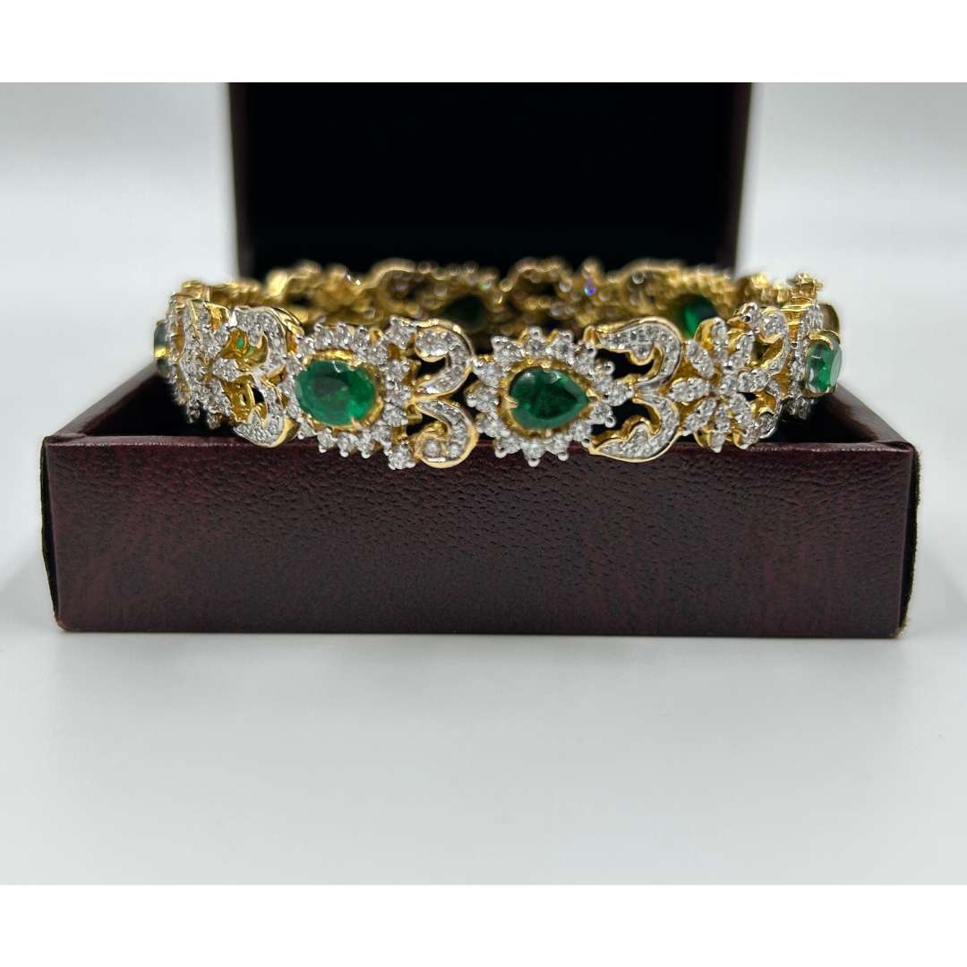 Bangle of Zambian Emeralds and Diamonds in Gold.